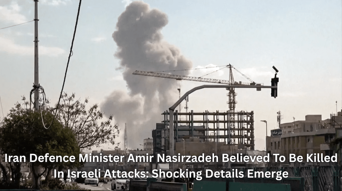 Smoke rising over Tehran buildings after Israeli airstrikes targeting Iran Defence Minister Amir Nasirzadeh.