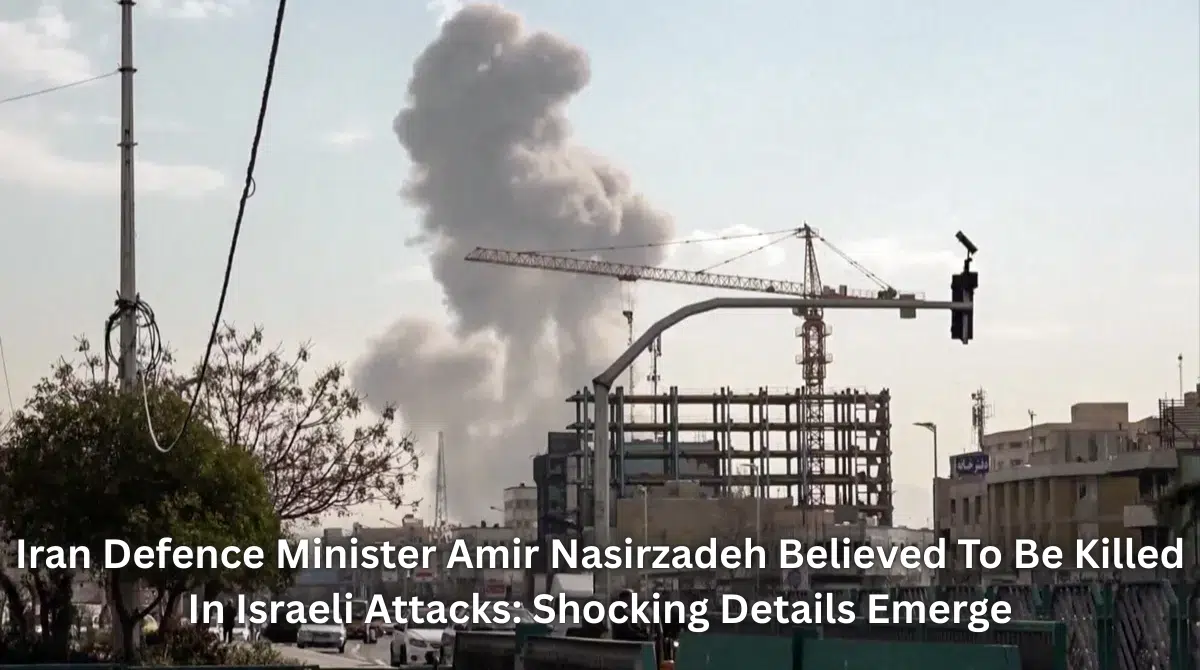 Smoke rising over Tehran buildings after Israeli airstrikes targeting Iran Defence Minister Amir Nasirzadeh.