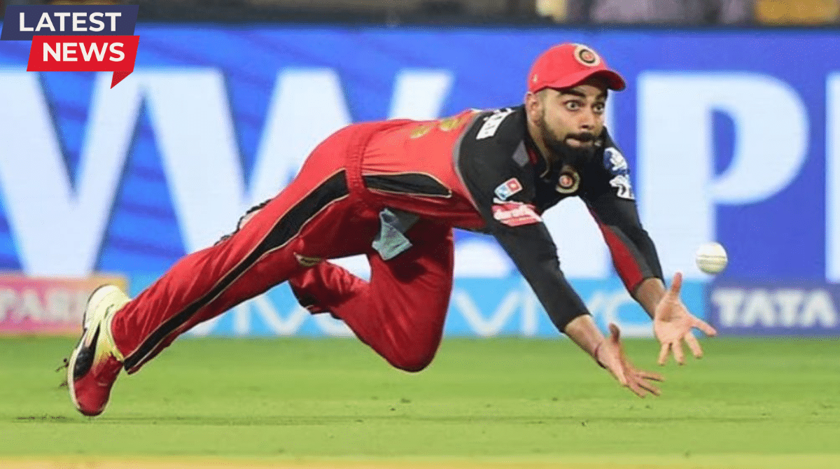 A cricketer in a red jersey dives forward to take a low catch during an IPL match, with a “Latest News” banner indicating a rules update.