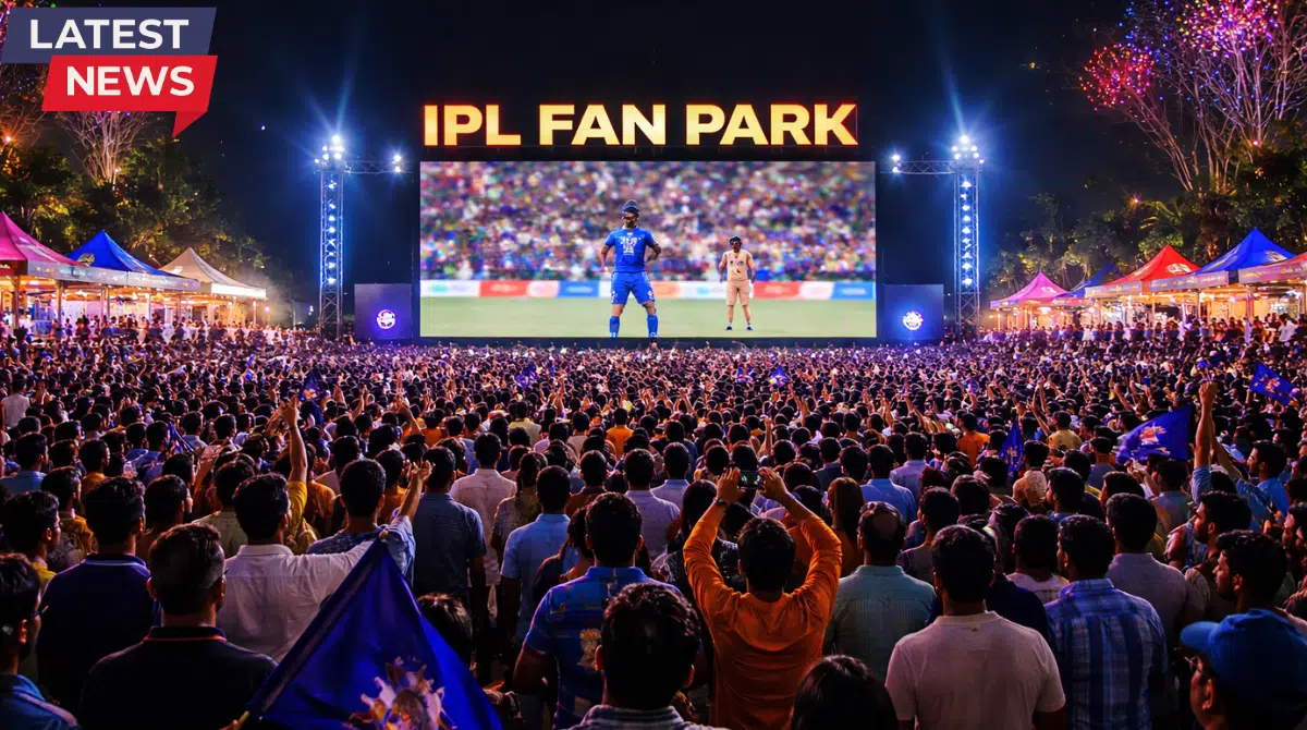 IPL Fan Park 2026 crowd watching live cricket match on giant LED screen at night with fireworks, lights, and cheering fans.IPL Fan Park 2026 crowd watching live cricket match on giant LED screen at night with fireworks, lights, and cheering fans.