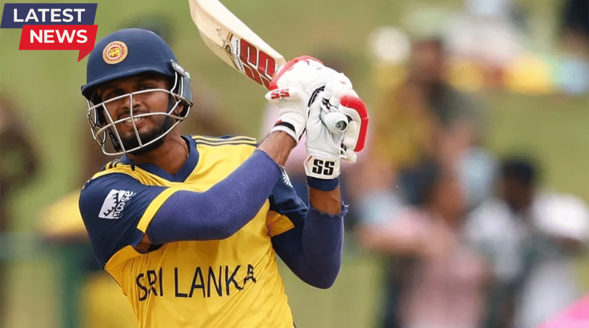 Dasun Shanaka playing a powerful cricket shot in Sri Lanka jersey during a match, captured mid-swing with bat raisedDasun Shanaka playing a powerful cricket shot in Sri Lanka jersey during a match, captured mid-swing with bat raised