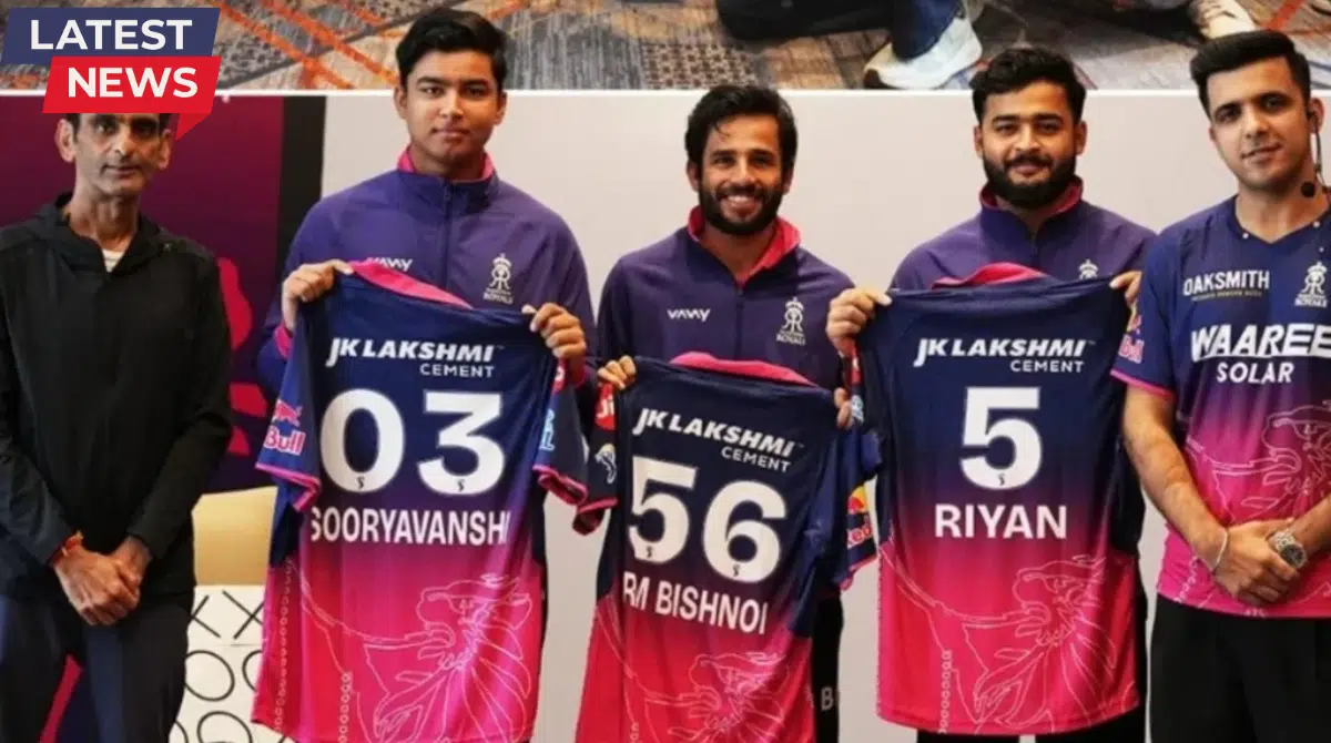 Rajasthan Royals players holding team jerseys during a press event, showcasing new squad members and branding announcementRajasthan Royals players holding team jerseys during a press event, showcasing new squad members and branding announcement