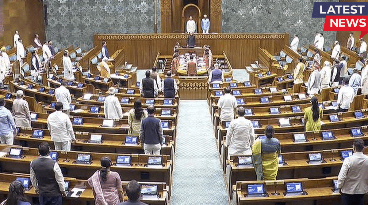 Indian Parliament session in progress with lawmakers standing inside the Lok Sabha chamber during a formal proceeding