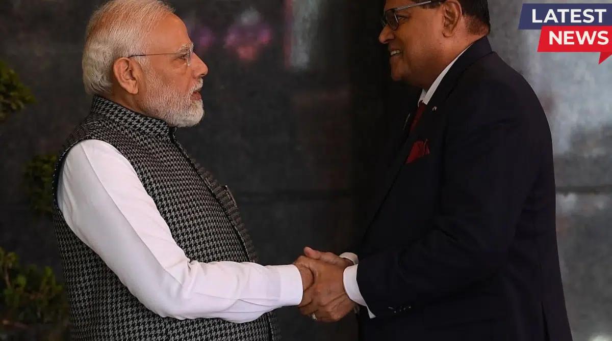 Indian Prime Minister Narendra Modi shaking hands with Suriname President Chan Santokhi during a formal meeting